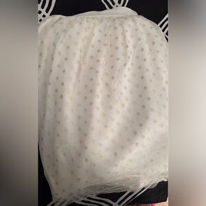Excellent condition Pottery Barn Kids tulle with gold dot crib skirt.
